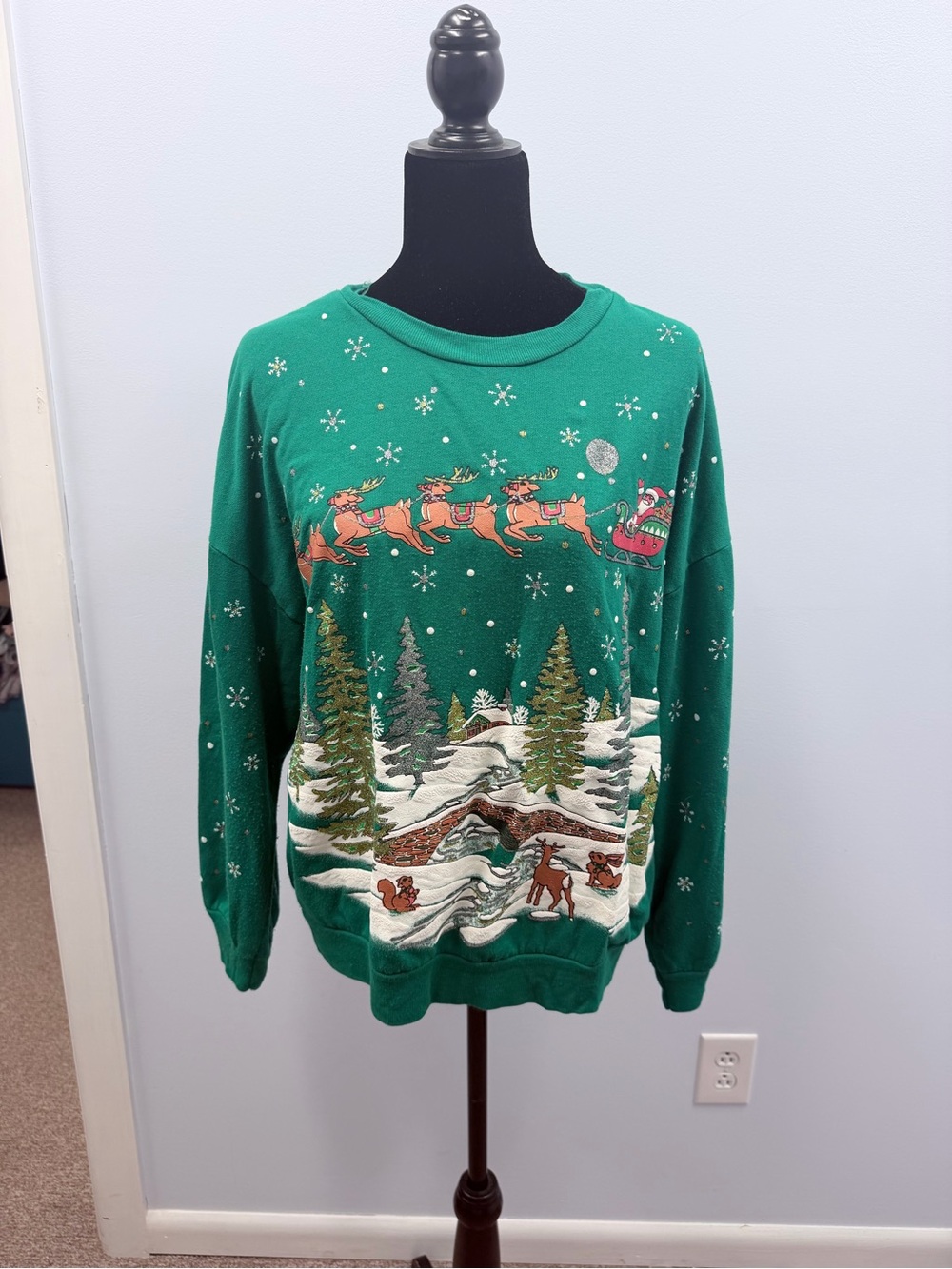 Women's Green Crewneck Holiday Sweater with Festive Winter Scene